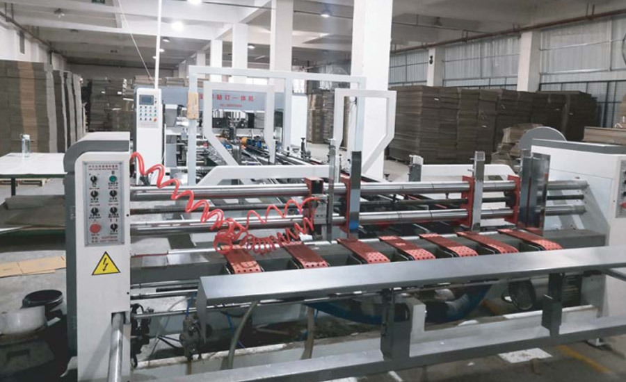 高速糊(hú)釘箱一體機(ji)